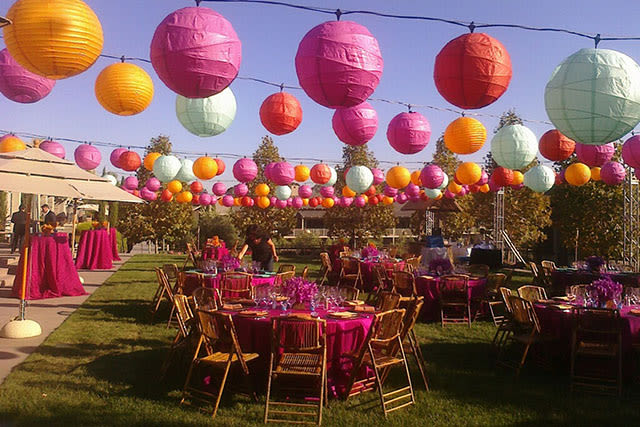 outdoor party with colorful hanging decorations