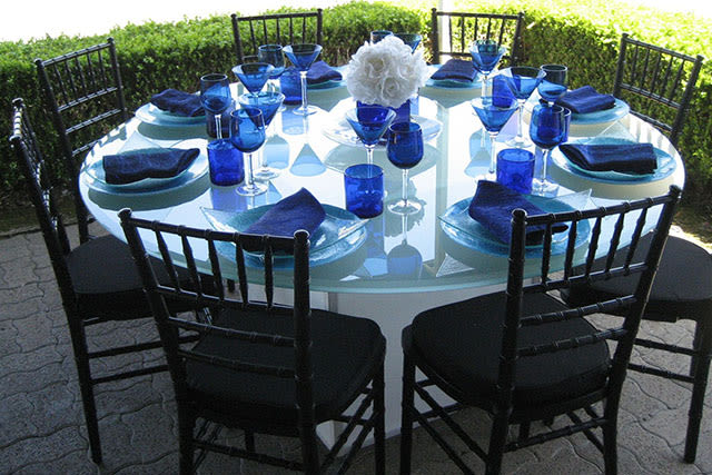 formal outdoor table setting with black and white