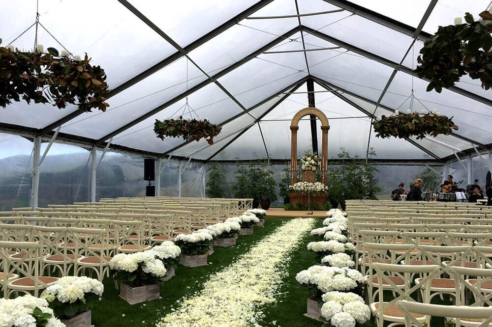 outdoor winter wedding ceremony under tent