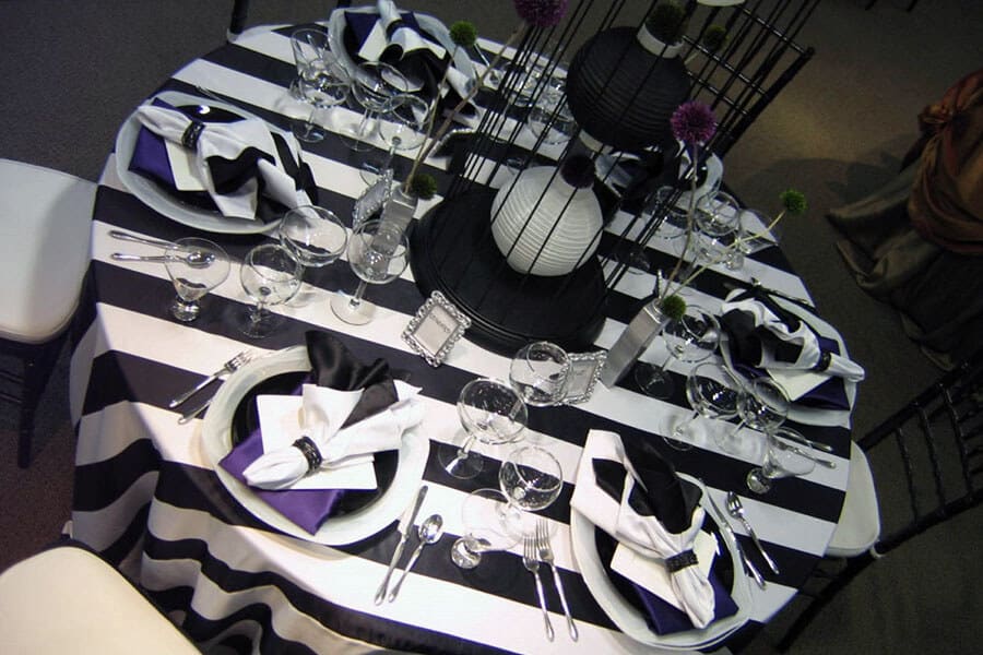 Round Table with Chairs and Black & White Patterned Linens rented round table with chairs and black and white patterned linens for birthday party
