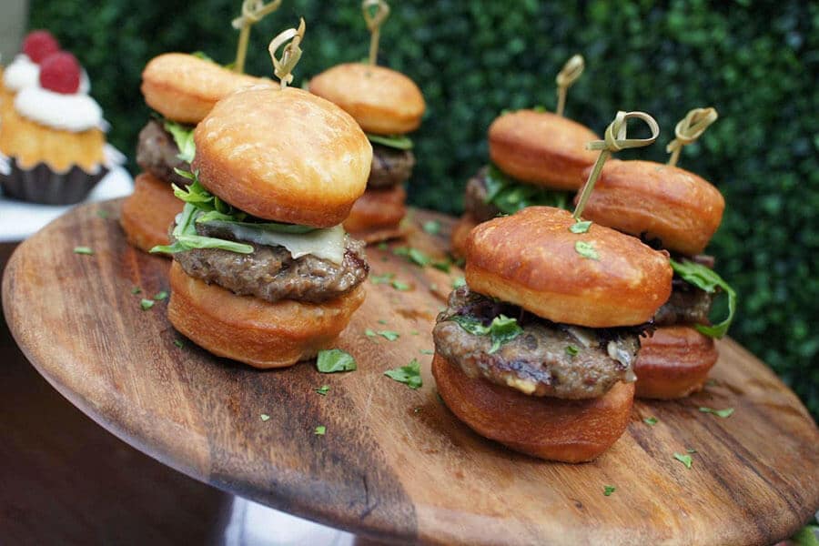 plate of hamburgers being served at birthday party