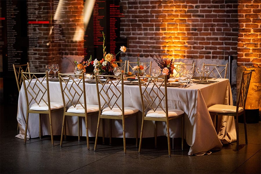 rectangular table setting with tablecloth and linen napkins