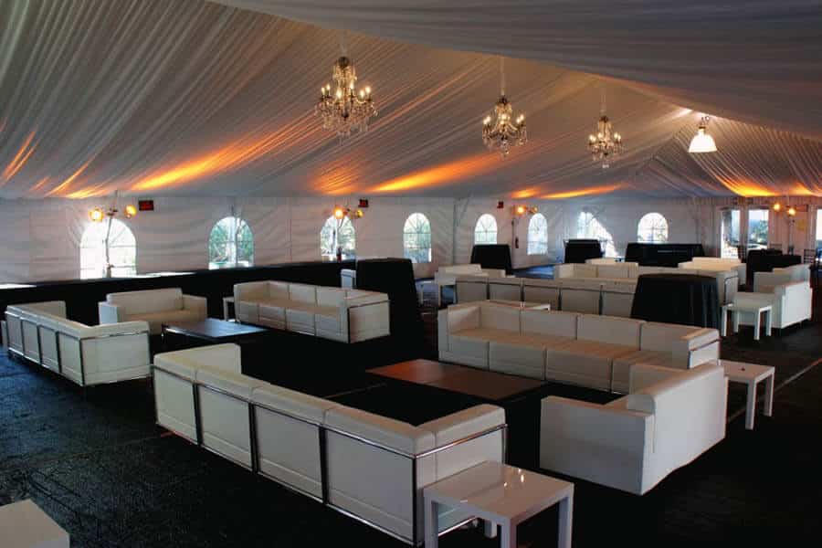 sailcloth tent interior with chandeliers and furniture for reception