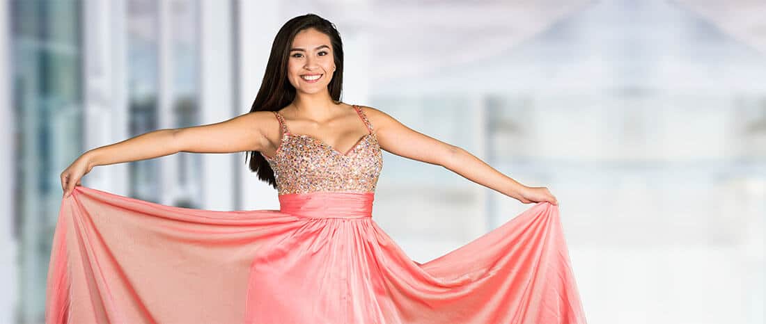 teen girl wearing Quinceañera gown