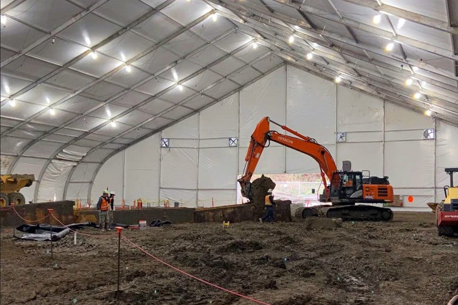 construction tent for job site with heavy equipment