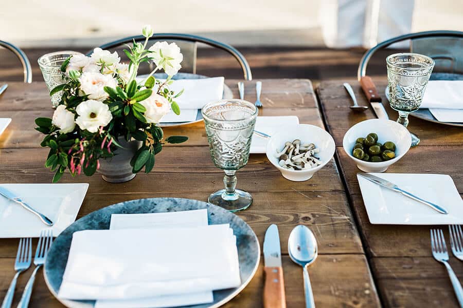informal tableware place settings outdoor wood tabletop