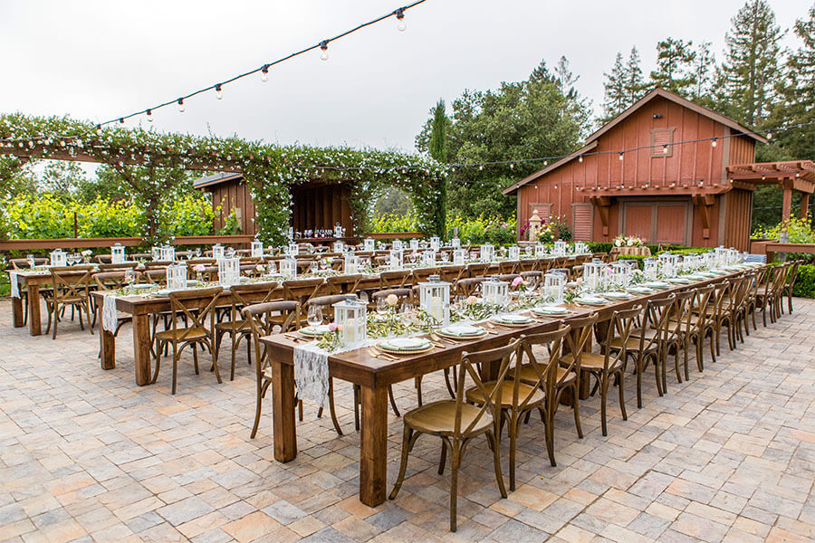 large outdoor event with rectangular tables